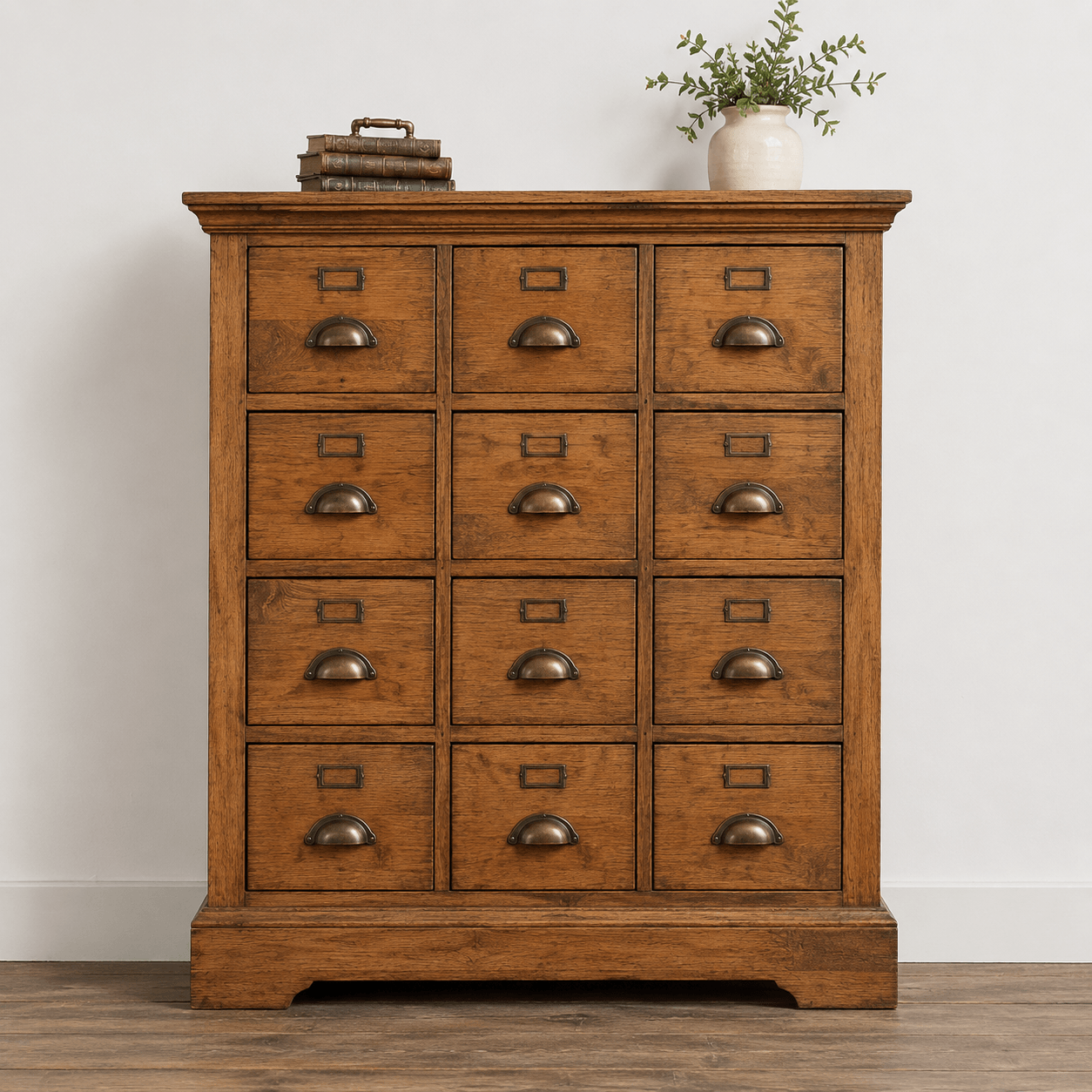 Wooden dresser with multiple drawers against a white wall