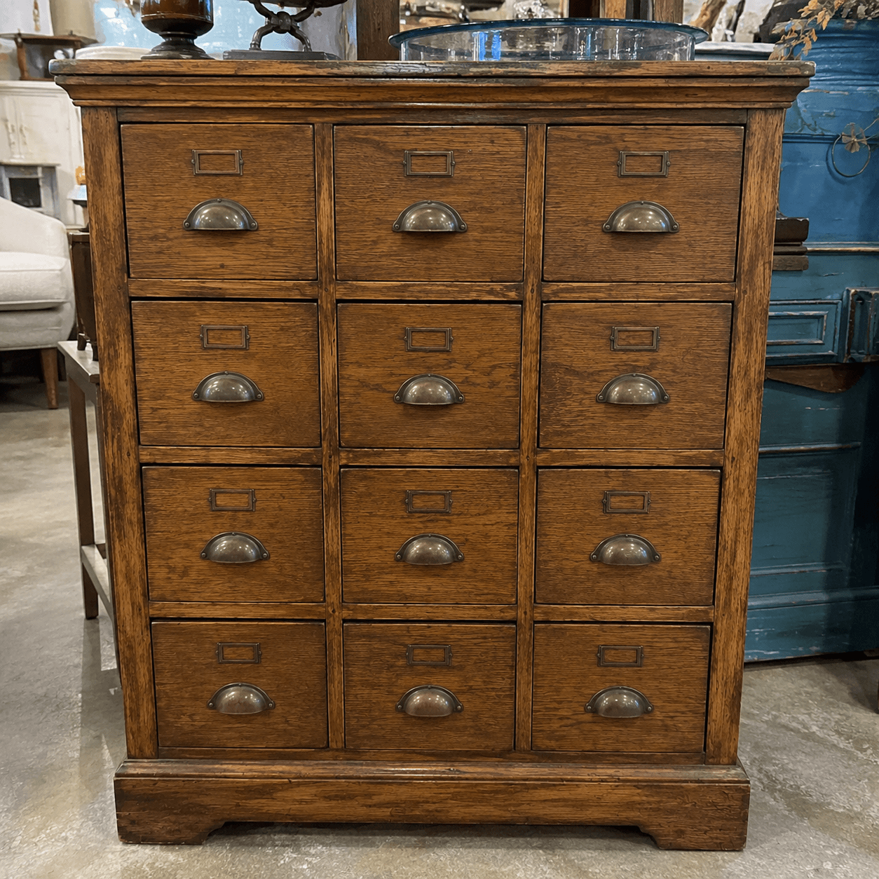 Wooden dresser with multiple drawers in a room setting